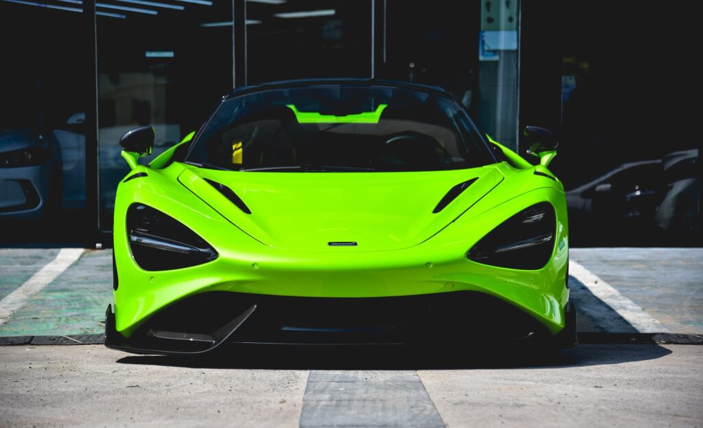 An image of a sports car going through a detailers service 01